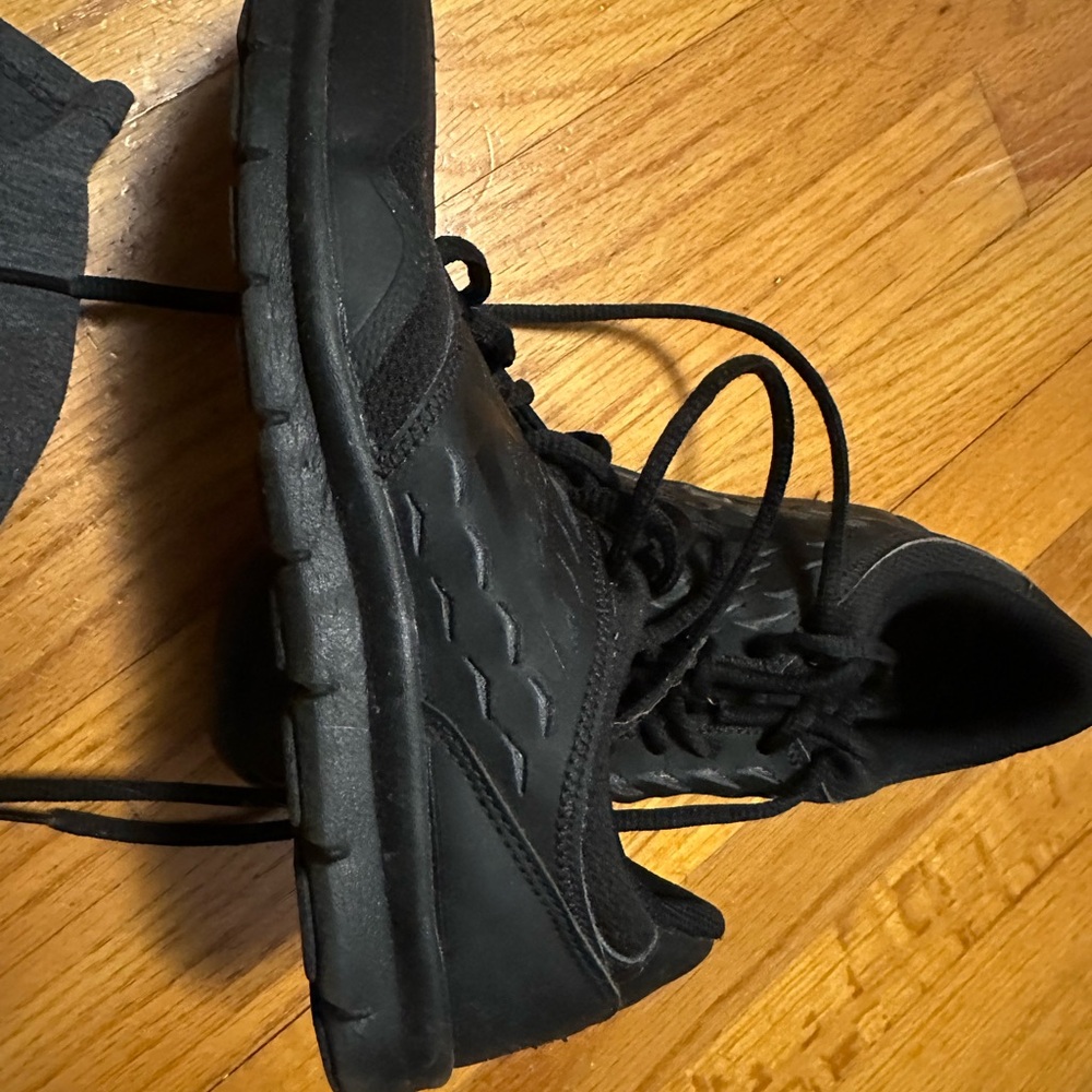 Nike Black Athletic Shoes with Sleek Design